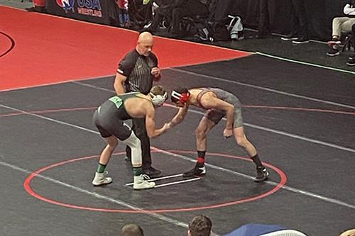 Kyle Owen wrestles at state